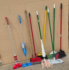 lot 222 image: Collection of 8 Various Cleaning Tools Including Mops, Brooms, and Scrubbers