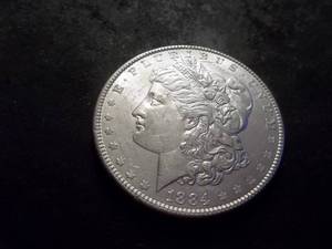 lot 10 image: 1884  Morgan Silver Dollar