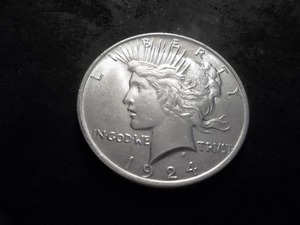 lot 28 image: 1924 Peace Silver Dollar