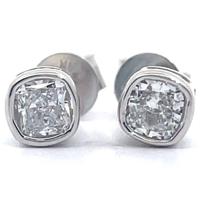 lot 36 image: Modern 0.50 Carat Diamond Cushion Bezel Solitaire Stud Earrings in 14k White Gold