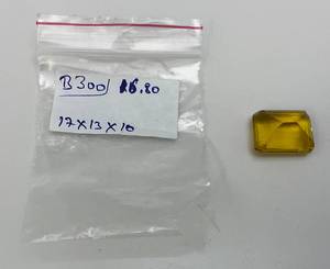 lot 150 image: 16.80 Ct Emerald Cut Yellow Gemstone