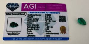 lot 153 image: AGI Labs 6.85 CT Pear Cut Green Andradite Garnet (Lab Created)