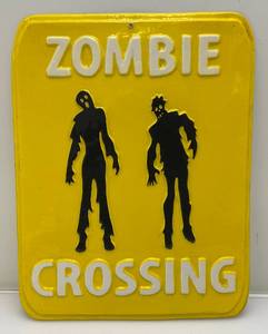 lot 241 image: Vintage Molded Plastic Zombie Crossing Sign 14 x 18