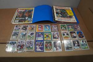 lot 106 image: Binder of Baseball and Football Cards and Magazines - Early 90s