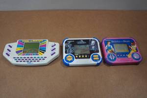 lot 228 image: 3 Vintage Handheld Games - Wheel of Fortune, Casper, Beauty and the Beast