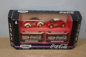 lot 264 image: Matchbox 1962 Volkswagen Beetles Coca-Cola Model Cars