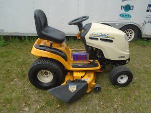 1043 Cub Cadet. 46 cut. Starts, runs & mows. Loose exhaust. Good condition. Used condition. TLC needed? As shown.