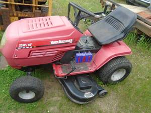 lot 101 image: 20 hp 46 cut Yard Machine rider chassis. No motor. As shown.