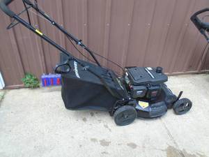 lot 114 image: Powersmart self propelled lawn mower with bag. Like new. Tested & works. As shown.