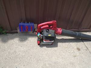lot 121 image: Troy Bilt gas blower. Tested & works. As shown.