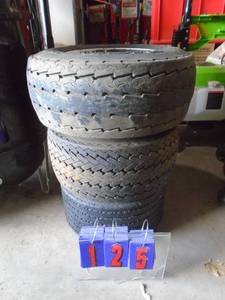 lot 125 image: 3 tires as shown. Trailer tires used.