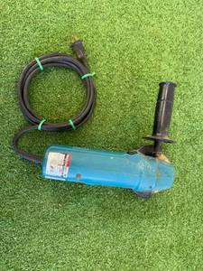 lot 23 image: Makita 4 Disc Grinder