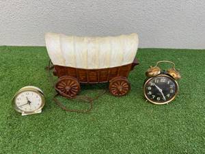 lot 76 image: Clocks & Wagon Lamp