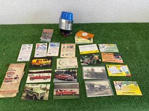 lot 155 image: Vintage Ford Postcards, 1948 Evinrude Booklet, Auto Magnet Light