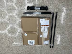 lot 14 image: TV Wall Mount Kit with Fold-Out Storage Compartments & Integrated Shelf  MSRP $149.99