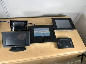 lot 87 image: Large Lot  Crestron & AMX Touchscreen Controllers & Docks  MSRP $6000