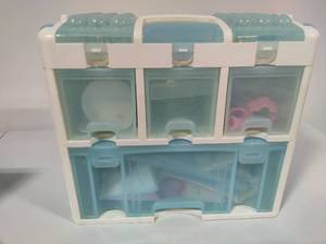 lot 73 image: Wilton Ultimate Tool Caddy Filled with Cake Decorating Supplies