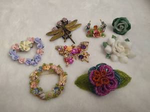 lot 125 image: Floral Brooches & Butterfly Pendant