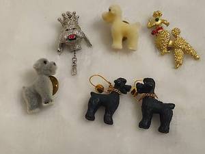 lot 126 image: Lot of Dog PinsCharm & Earrings