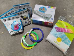 lot 140 image: Lot of New Pool ToysRaftsAccessories