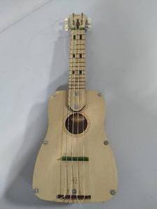 lot 144 image: Kiwi Co. Kit-Built Wooden Ukulele