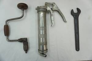 lot 133 image: Vintage Brace Hand Drill, Vintage Open-Ended Wrench, and Grease Gun