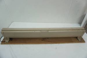 lot 154 image: Mounted baseboard plug-in heater