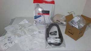 lot 14 image: Roscoe mini nebulizer compressorand Supplies.