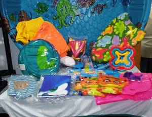 lot 25 image: Childrens Pool, Sprinkler, Sonic, Mickey Mouse and More.