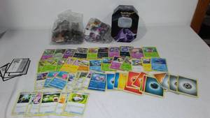 lot 41 image: Pokemon Cards and Puzzles (2).