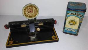 lot 45 image: Vintage Marx Dial typewriter and Monarch Coco Can