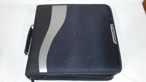 lot 49 image: Soundkase Zippered DVD Keeper with Popular 49 DVDS. Blind Side, Jurassic Park, Batman.