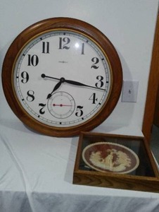 lot 51 image: Howard Miller Clock and Gayle Bright Appleby plate framed. Clock is 26 in. in diam.