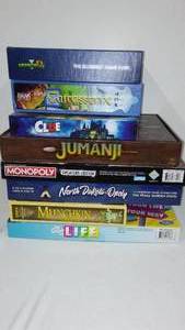 lot 57 image: Board Games Jumanji, Life, Opolies and More.
