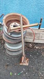 lot 64 image: Rims, Jack And Air Pump.