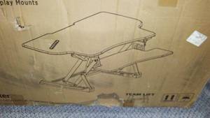 lot 104 image: Sit Stand Desk Converter.