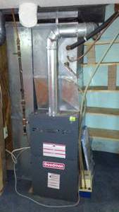lot 144 image: Cabin Tear-down Goodman Natural Gas Furnace, Sump pump and Rheem AC.