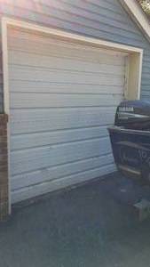 lot 146 image: Cabin Tear-down Insulated Garage Door, Rails and Chamberlin Opener.
