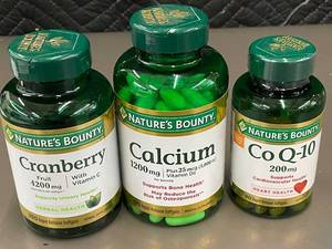 lot 66 image: Natures Bounty Supplement Set of 3 - Cranberry, Calcium, Co Q-10