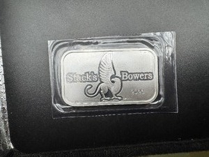 lot 79 image: 2023 BU Stacks & Bowers 1 Oz. Silver Bar