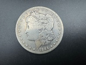 lot 11 image: 1884 Morgan Silver Dollar