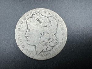 lot 12 image: 1884-O Morgan Silver Dollar