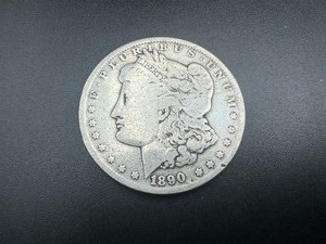 lot 14 image: 1890-O Morgan Silver Dollar