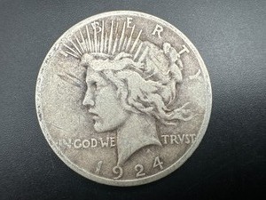 lot 38 image: 1924 Peace Silver Dollar