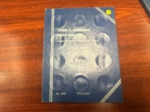 lot 43 image: Two 90% Silver, Four 40% Silver and Two Clad Kennedy Half Dollars in Whitman Book