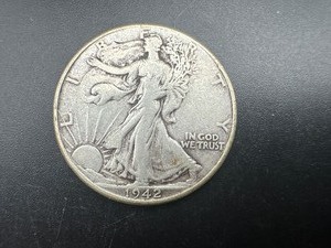 lot 54 image: 1942 Silver Walking Liberty Half Dollar