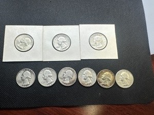 lot 62 image: Nine Silver Washington Quarters