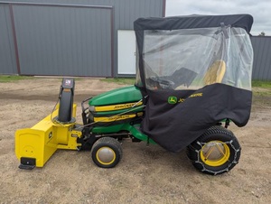 2011 John Deere X534 Tractor with Mower Deck, Plow and Cab Enclosure. Low Usage!