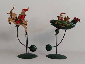 lot 8U image: Pair of Motion Sculpture Vintage Christmas Santa Balancing Decor Pieces