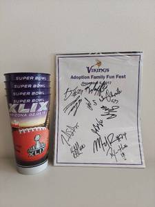 lot 60U image: Minnesota Vikings Autographed Poster with Super Bowl XLIX Cups